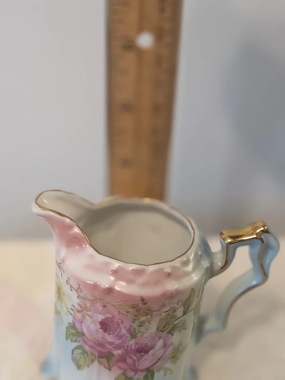 Antique Porcelain Footed Creamer R. S. Prussia Floral Design Trimmed In Gold.